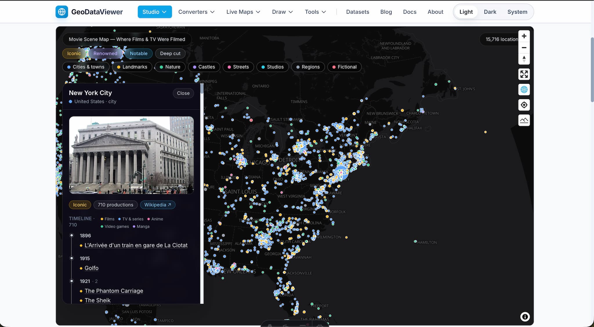 GeoDataViewer Movie Scene Map showing filming locations color-coded by category on an interactive globe with filter chips and a detail popup